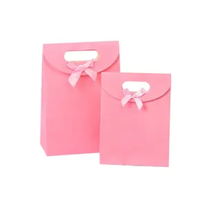 Bolsa de regalo de compras de papel blanco con lazo personalizado para mujer, bolsa de embalaje con cinta para comprar ropa y regalo