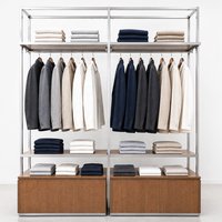 Système de présentation de vêtements en métal chromé argenté avec tringle à vêtements et armoire de rangement sur base en chêne – Vente en gros