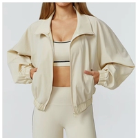 Vêtement de sport léger et écologique en Spandex/Nylon sans couture à séchage rapide, col montant, coupe-vent, extensible dans quatre directions, avec fermeture éclair sur le devant pour femme