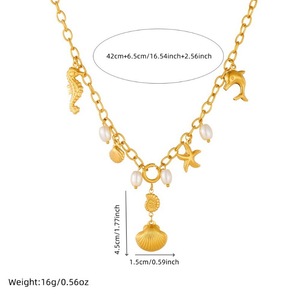 Collana con ciondoli a forma <span class=keywords><strong>di</strong></span> stella marina, cavalluccio marino e delfino in acciaio inossidabile anallergico, placcata oro, con conchiglia e nappa, stile marino - Product Image 6