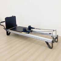 Machine de Pilates Reformer Professionnelle Ajustable et Portable en Alliage d'Aluminium pour la Gym et l'Utilisation en Studio