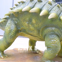 Sculpture de dinosaure animatronique de haute qualité en fibre de verre verte avec fonction résistante aux intempéries pour une utilisation en intérieur/extérieur