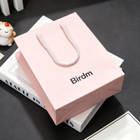 Sacs en papier d'emballage de luxe personnalisés en gros avec votre propre logo, tendance pour la vente au détail, sacs en papier cadeau avec poignée