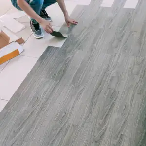 1.0mm Peel And Stick Vinyle Plancher LVT PVC Meilleure Vente Produits Bois Comme Carreaux En Plastique Auto-Adhésif Vinyle En Plastique Plancher