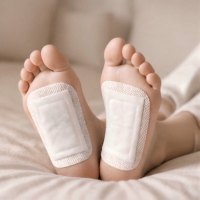 Patchs chauffants pour les pieds Qichun Qi Ai à l'armoise avec sangle réglable, compresses chaudes naturelles à base de plantes pour les pieds, OEM