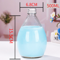 Bouteille de boisson en verre en forme de goutte d'eau avec bouchon à vis en aluminium pour l'emballage de jus, de lait, de thé et de boissons froides
