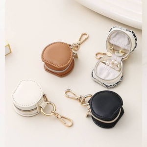 Portable Mini Travel Jewelry Box Simple New Round PU Leather <b>Case</b> for Pendant <b>Earrings</b> and Rings Keychain Included - Product Image 6