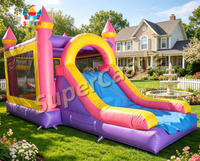 Château gonflable commercial avec toboggan pour événements et fêtes d'enfants à louer