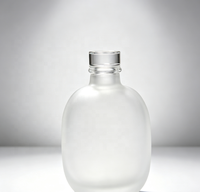Vente en gros de bouteilles en verre ovales givrées de 300 ml pour jus, thé et boissons