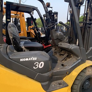 Used Komatsu Diesel <b>Forklift</b> 3 Ton FD30/5 Ton FD100 4WD Solid Tire Rough Terrain Two Stage Mast - Product Image 4