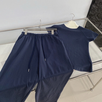 Vêtements pour femmes en gros, nouvelle mode, ensemble décontracté en jacquard, haut à manches courtes et pantalon long