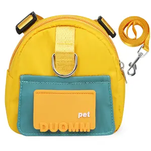 Vendite calde zaino per cani da compagnia imbracatura Set di guinzaglio personalizzato commercio all'ingrosso all'aperto regolabile per cani da passeggio Set con borsa zaino