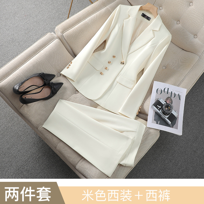 Off-white suit with slightly flared trousers