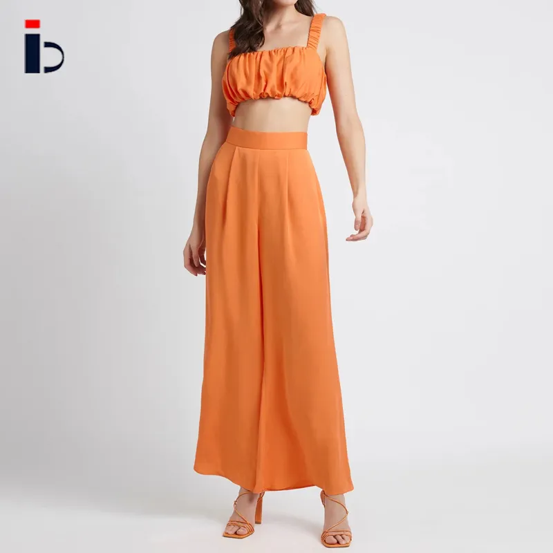 Ensemble 2 pièces de vêtements de couleur Orange pour femmes, débardeur et pantalon froncé, Sexy, de bonne qualité, printemps et été, vente en gros,