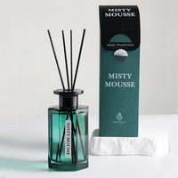 Ensemble diffuseur de roseau de luxe classique bouteille en verre vert parfum de maison avec 4 bâtons noirs pour la décoration de la chambre