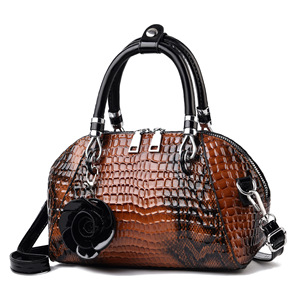 Bolsos de mano de piel sintética con estampado de serpiente para mujer, bolsos de lujo con colgante de flor, bolsos de mano para mujer - Product Image 1