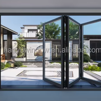 Porte pliante en verre en alliage d'aluminium moderne imperméable avec surface finie pour entrée de villa, balcon et patio