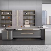 Bureau de direction en forme de L avec panneau matelassé en losanges, gris anthracite, table de bureau moderne de luxe pour PDG, design futuriste