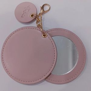 Espejo de maquillaje redondo portátil de cuero PU, plegable y compacto con llavero para mujeres, para viajes. - Product Image 1