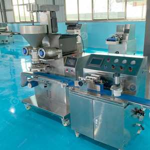 Machine à encruster pour la fabrication de dattes mochi, de boules mochi, de maamoul, de remplissages de tamales, de biscuits et de gâteaux de lune - Product Image 2