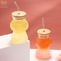 Gobelet en verre rayé en forme de gourde avec couvercle en bambou et paille réutilisable