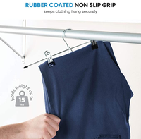 Fabricant en gros de cintres à pantalons, jupes et robes en acier inoxydable, finition brillante, gain de place, pour utilisation dans le salon