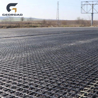 Géogrille en fibre de verre enduite de bitume, géomaille en fibre de verre pour le renforcement des sols meubles, construction routière