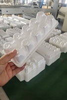 Machine pour la fabrication de boîtes à œufs et plateaux en mousse de polystyrène