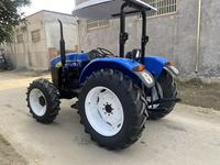 Tracteur à roues Shanghai Holland 804 d'occasion, 4x4, 80 CV, moteur diesel 4 cylindres, boîte de vitesses, cabine fermée, bleu noir, 2000 heures de travail