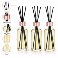 Diffuseur de parfum cylindrique en verre de 50 ml avec bâtonnets noirs pour la maison