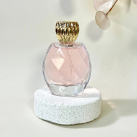 Conteneur de parfum en verre OEM & ODM, logo personnalisé imprimé UV, revêtement de couleur varié pour les marques de parfums