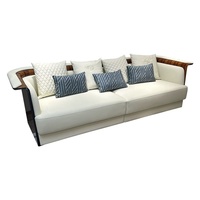 Ensemble de canapés en cuir véritable de luxe italien en forme de U, style moderne et simple, avec placage de bois rouge haut de gamme pour villa.