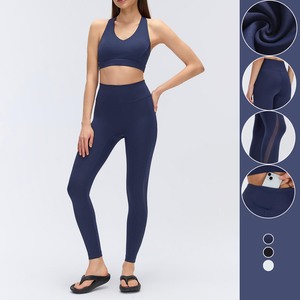 YIYI Ensemble de sport 2 pièces pour femme : Soutien-gorge de sport antichoc col en V effet seconde peau et Leggings effet push-up dos croisé - Product Image 1