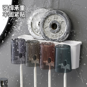 Ensemble de porte-brosses à dents transparents, à fixer au mur avec ventouse, pour salle de bain, usage familial, facile à nettoyer, conception durable - Product Image 1