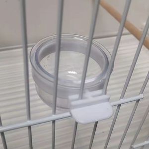 Toptan 5.5cm çap şeffaf asılı şeffaf akrilik kuş papağan tohum mama besleyici dağıtıcı kase için kafes - Product Image 2