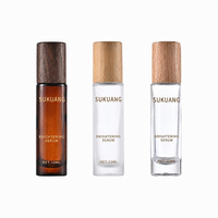 En stock: Botella roll-on de nogal de 10 ml, botella roll-on de madera de bambú, botella de aceite esencial de madera de fresno, botella de vidrio para recarga de perfume.