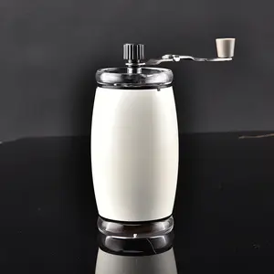 Atacado de fábrica aço inoxidável bainha de cerâmica ajustável manual moedor de café com jarra