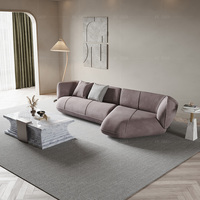 Canapé d'angle modulable en velours uni pour salon d'appartement