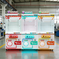 Nouvelle conception Kising : Machines à griffes commerciales avec code QR, personnalisables en bleu et orange, avec options de prise et de langue.
