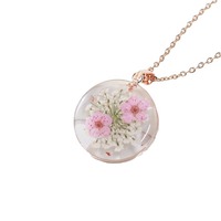 Bijoux de collier en acier inoxydable doré haut de gamme à la mode avec chaîne à maillons vraie fleur et pendentif en résine transparente de fleur séchée