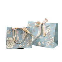 Sac en papier de luxe de haute qualité avec poignée en ruban pour emballage, idéal pour bijoux, parfums, mariages, petits cadeaux et boutiques de détail