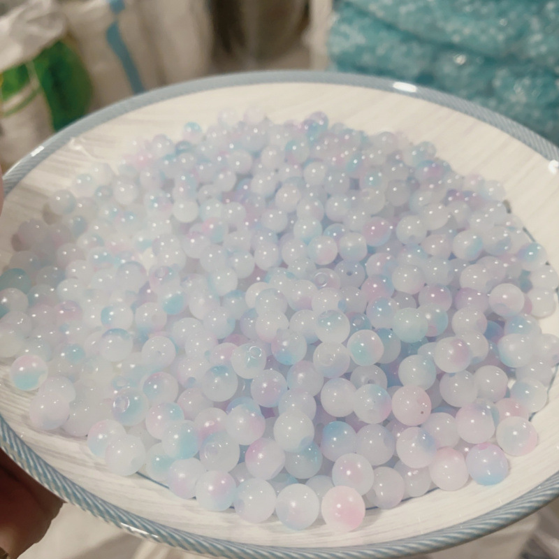 White, pink, and blue [8mm light-sensitive color-changing beads]
