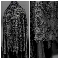 Unregelmäßiger Schwarzer Distressed-Stretch-Strickstoff mit Löchern 3D-Strukturierter Jersey-Stoff für Avantgarde-Designerkleider
