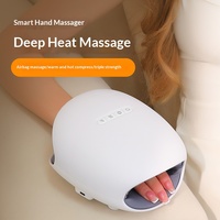 Masseur électrique pour les mains avec chaleur et compression d'air, massage des doigts et de la paume pour soulager la douleur