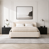 Lit double surdimensionné minimaliste européen moderne avec tête de lit incurvée, tissu doux et pieds en bois de noyer durable