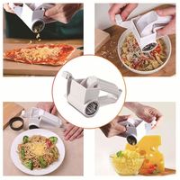 Alat Dapur Pemotong Putar Manual Warna Putih, Bahan Stainless Steel, untuk Mengiris Buah, Sayur, dan Memarut Keju (Plastik) - Promo!