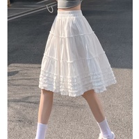 Jupe trapèze blanche pour femme, style preppy chic, taille haute, ample, avec volants, mini-jupe d'été décontractée et mignonne