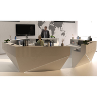 Comptoir de réception en granit personnalisable en forme de L, avec façade en pierre massif, pour hall d'entreprise
