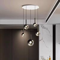 Lustre en verre à bulles dégradées multi-tailles pour plafond haut, idéal pour villa, atrium, escalier