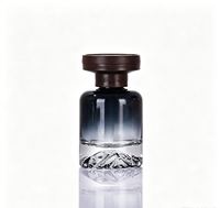 Bouteille d'aromathérapie en verre cylindrique de luxe de 120 ml avec base en forme de montagne pour la décoration de la maison et la diffusion d'encens